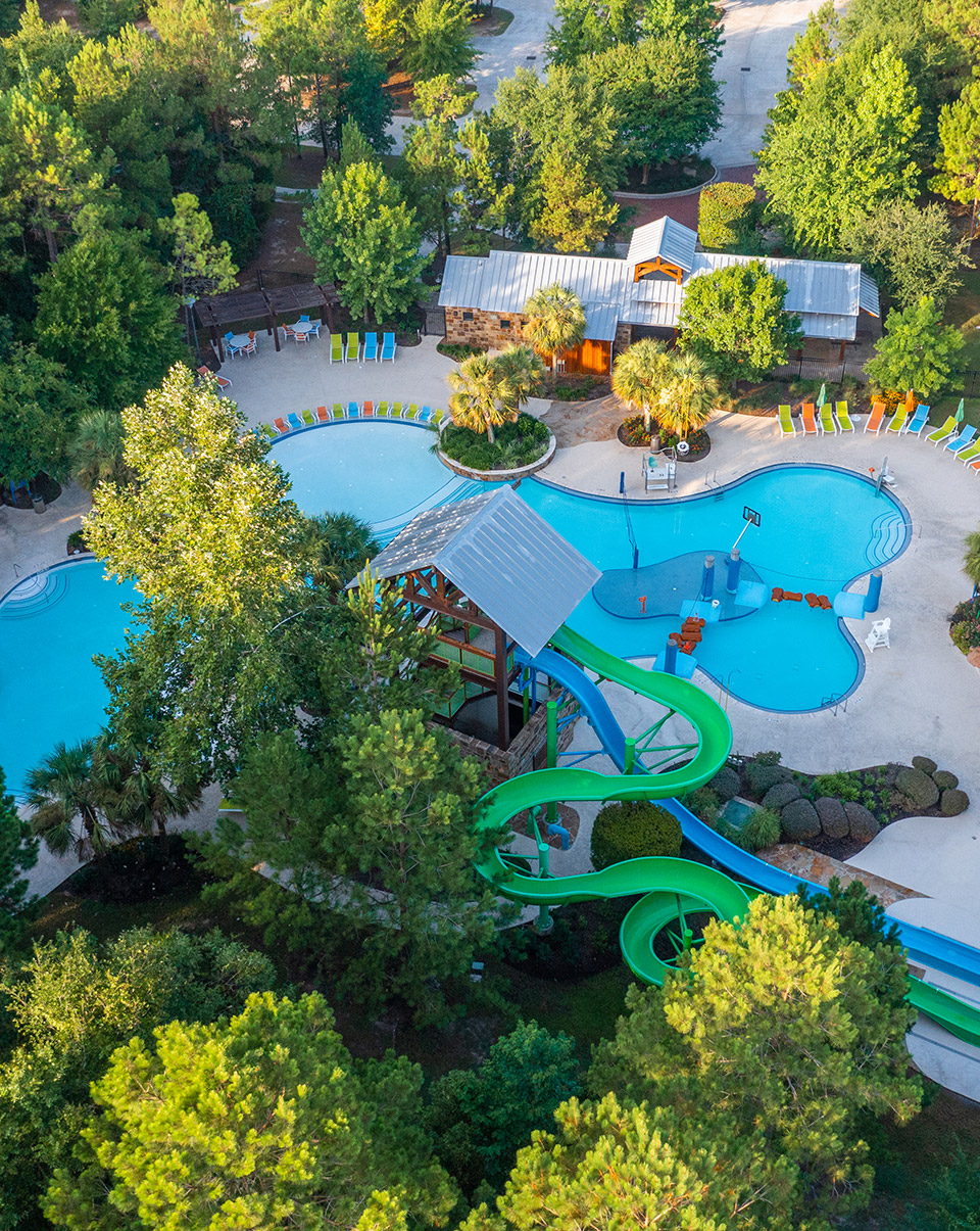 Forest Island's pool, seating, and water park in Woodforest in Montgomery County.
